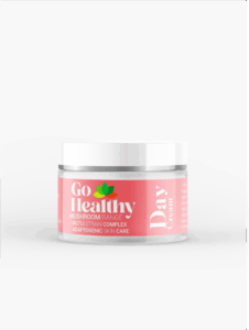 A white jar of Go Healthy Day Cream from the Mushroom Range, featuring a pink label, against a plain white background.