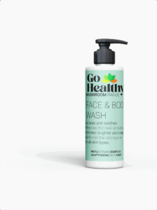A white bottle of Go Healthy Face & Body Wash from the Mushroom Range with a light green label and black pump dispenser, on a plain white background.