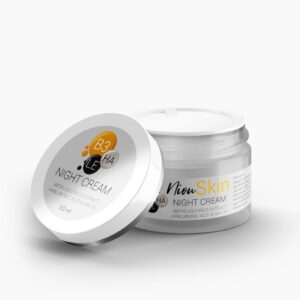 An open jar of Niou Skin Night Cream with the lid next to it. The label highlights ingredients like Licorice Extract, Hyaluronic Acid, and Niacin.