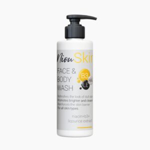 A white bottle of Niou Skin Face & Body Wash with a black pump dispenser is shown. The label lists key ingredients like Niacin, B3+, Licorice Extract, and HA.