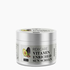 A white jar of Rexicare Vitamin Enriched Sun Screen, showing a label with illustrations of an avocado and a nut, and the product name.