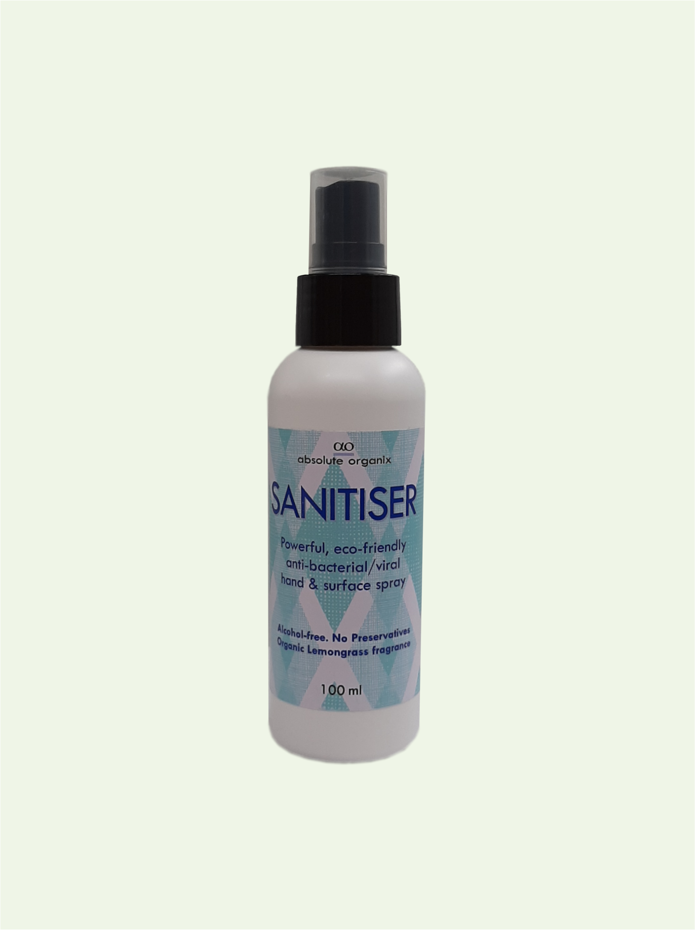 A white bottle of Absolute Organix Sanitiser with a spray nozzle and a label with a geometric pattern.