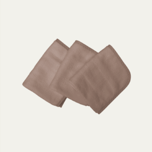 Three folded, square-shaped, plush cloth wipes in a mocha color, arranged in a staggered stack on a light background.